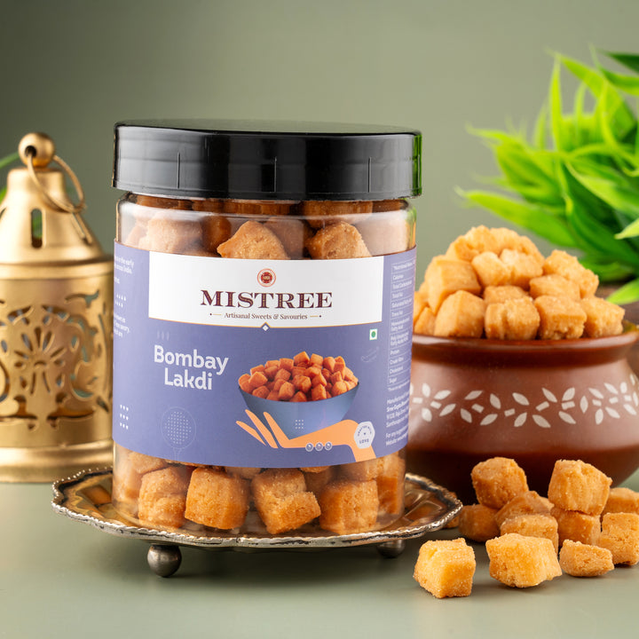 Bombay Lakdi, a traditional Indian snack, displayed in a bowl. These crispy, golden-brown sticks are made from a mix of flours and spices, perfect for snacking or as a crunchy topping for chaats. The image emphasizes their enticing texture and appetizing appearance, appealing to snack lovers.